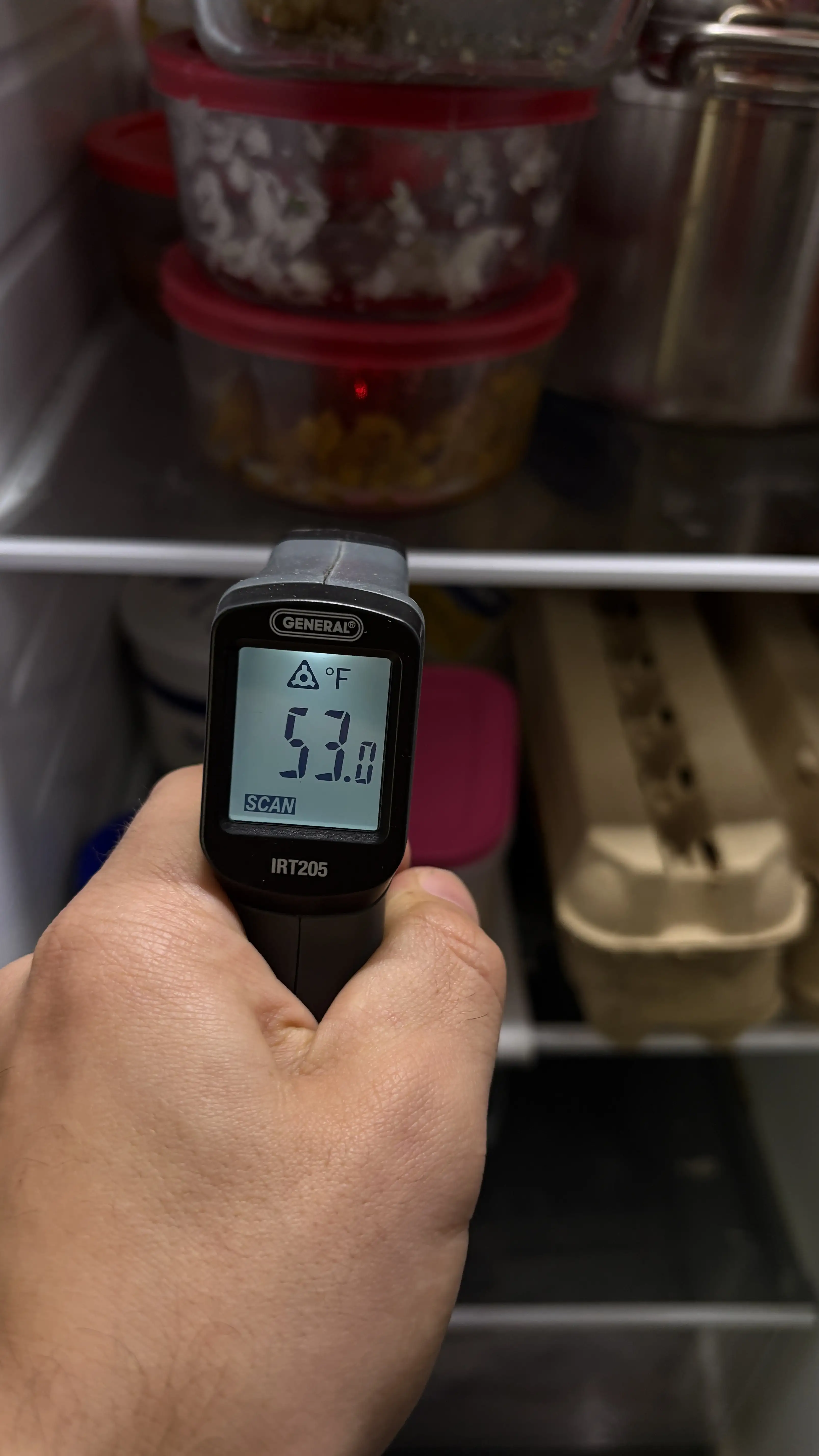 LG refrigerator not cooling — technician checks 53°F internal temperature